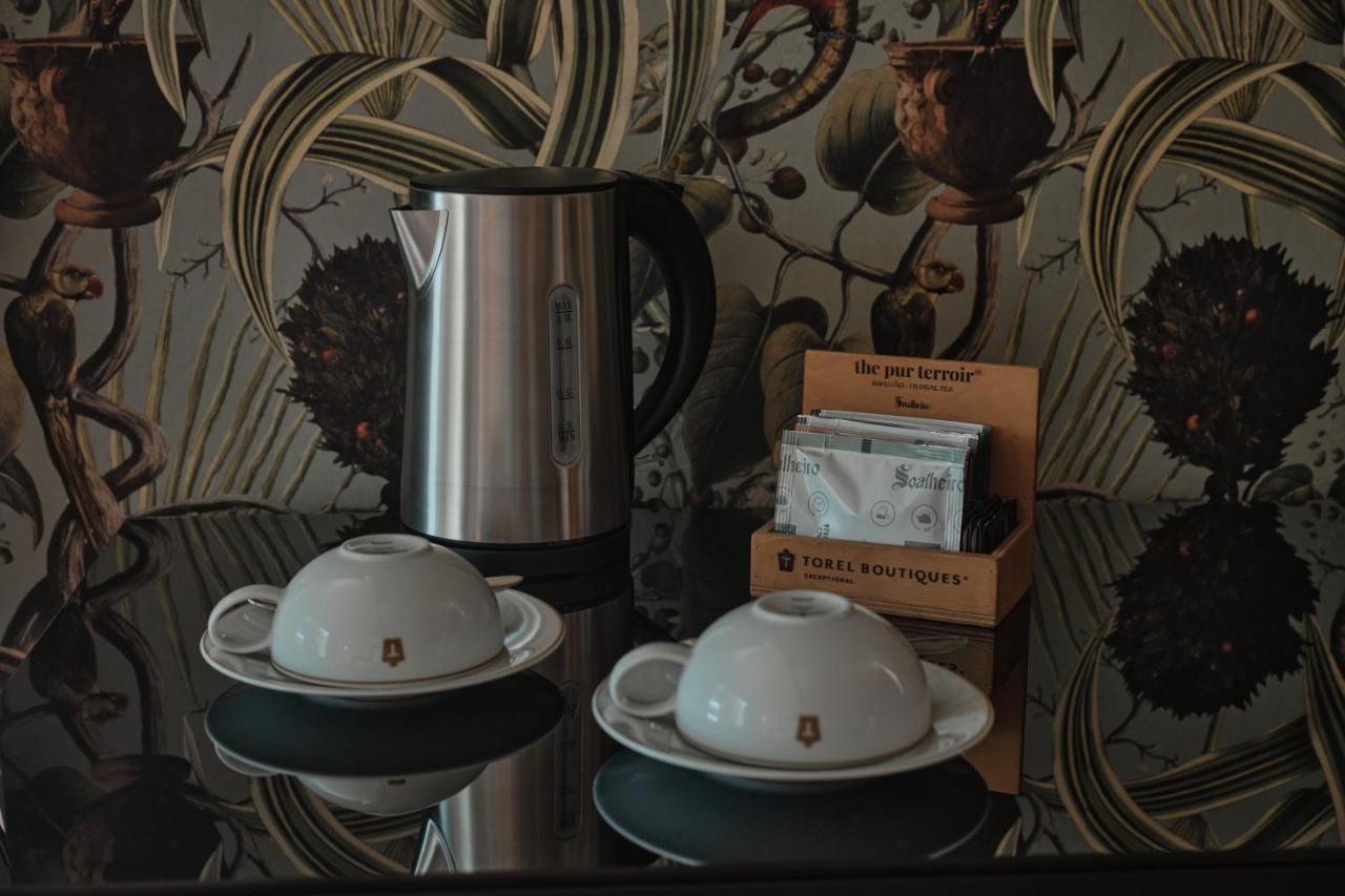 토렐 팰리스 리스본 호텔 외부 사진 A tea kettle